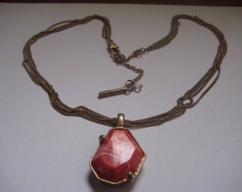 Kenneth Cole Orange and White Plastic Pendant and 4 Chains in Gold Tone