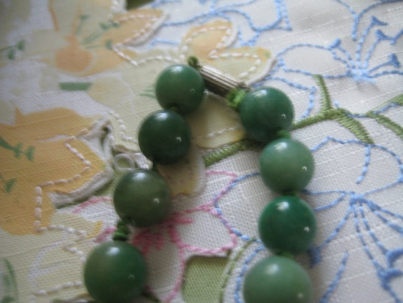 Natural Color Jade Beads Hand Tied with Silk and Barrel Clasp 24 Inches Long 46 11mm Beads
