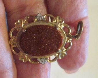 Lovely Gilt Goldstone Pendant Reproduction of a Victorian Piece 1 3/8x7/8"