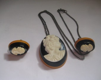 Vintage 20s or 30s Butterscotch Black Bakelite and Celluloid Lady Face Pin and Screwback Earrings