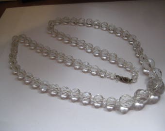 28 Inch Pools of Light Rock Crystal Necklace with Faceted Graduated Beads