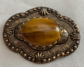 Vintage Oval Tigereye Cabochon in Gold Tone Steel Brooch