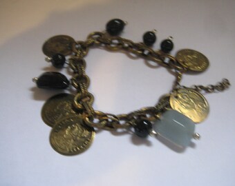 G E Wilson Designs Vintage Brass and Copper Bracelet  with Black Glass and Faux Coin  Dangles
