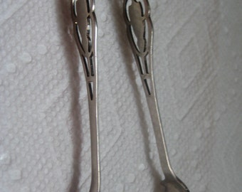 Manchester Sterling Company Crown Cross M Sugar Tongs Pattern BAKER Pierced Handle