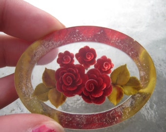 Oval Back Carved Roses in Lucite from the 40s