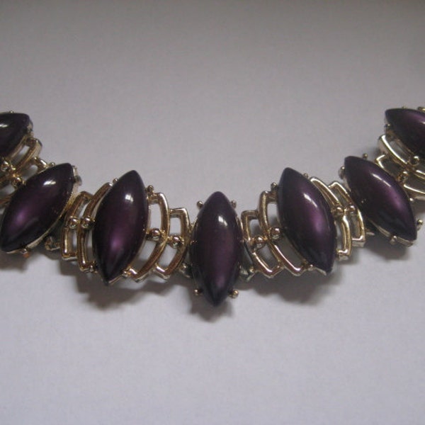 Gold Tone Panel Bracelet with Purple Poured Plastic Cabochons