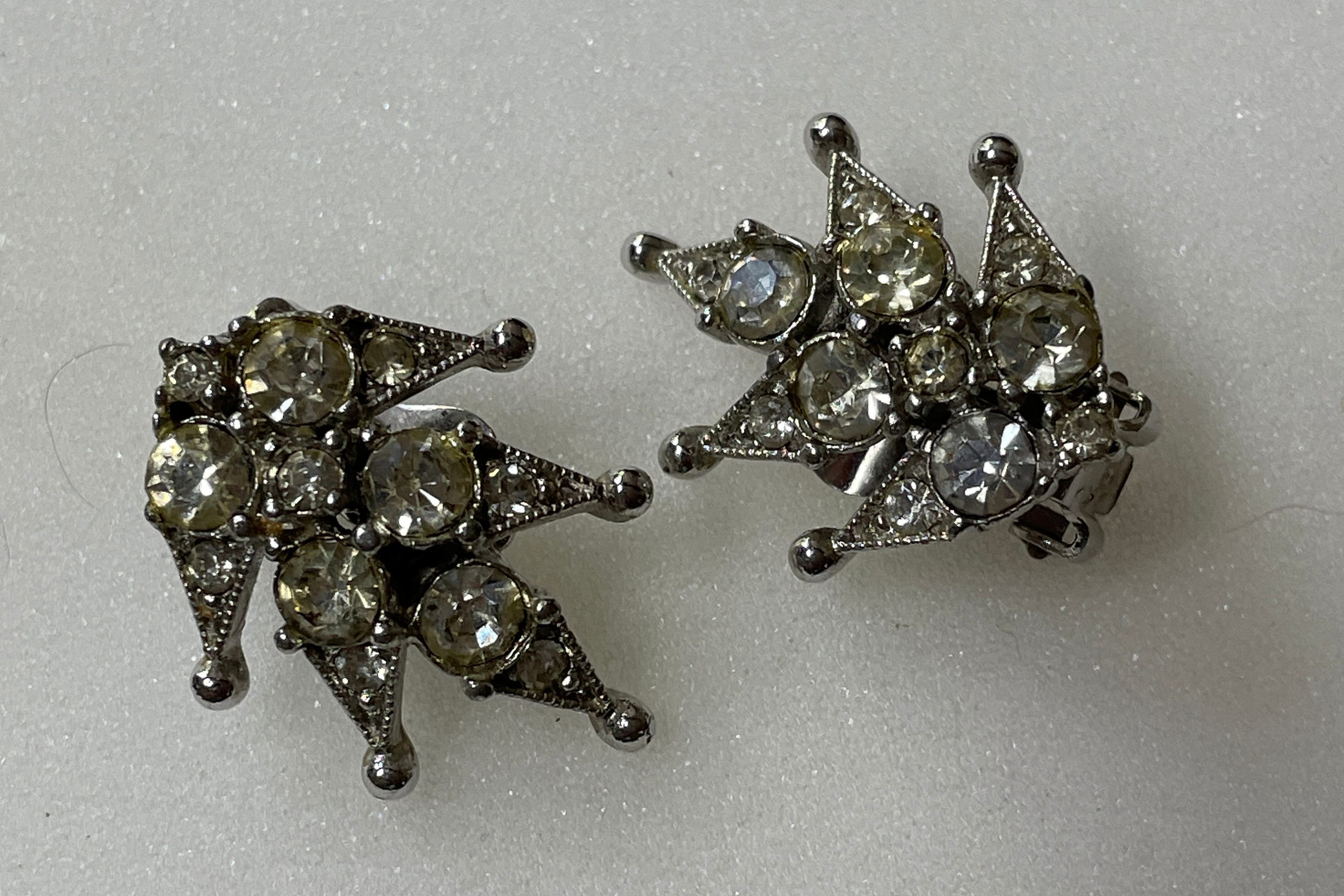 BOGOFF Signed Rhodium Plated Clip on Earrings With Chaton