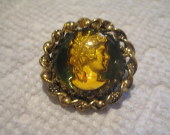 Back Carved and Painted Gold Right Facing Cameo in Glass and Gold Twisted Rope Frame 7/8"