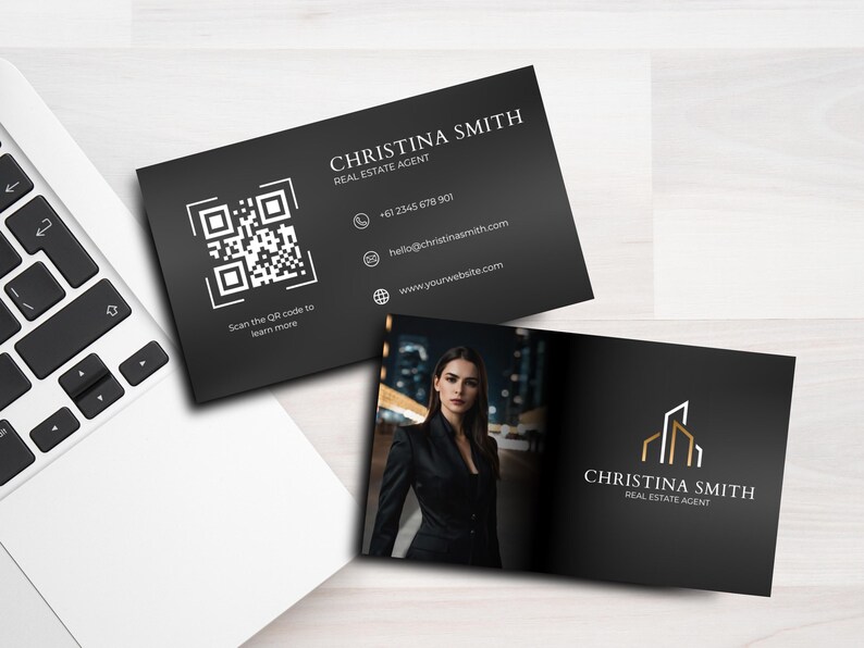 May include: Black and white business card with a QR code, contact information, and the text "CHRISTINA SMITH REAL ESTATE AGENT". The back of the card features a photo of a woman in a black blazer and a gold building logo with the text "CHRISTINA SMITH REAL ESTATE AGENT".