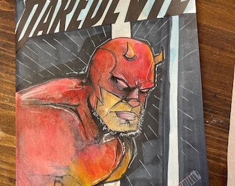 Dessin original de Daredevil sur une couverture à croquis