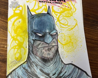 Dessin original de Batman sur une couverture de croquis