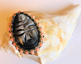 Carved Mask Brooch Mask Large Oval Mask Face Coral Beads Embroidered Theatrical Brooch Remember Corona Ethnic Tribal Face by enchantedbeas