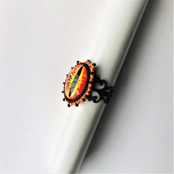 Deliver us from evil by enchantedbeas Sauron Eye Filigree Beadwoven Ring Orange Black Statement Eye of Sauron Ring Gold Plated Ring Base