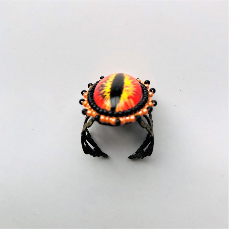 Deliver us from evil by enchantedbeas Sauron Eye Filigree Beadwoven Ring Orange Black Statement Eye of Sauron Ring Gold Plated Ring Base
