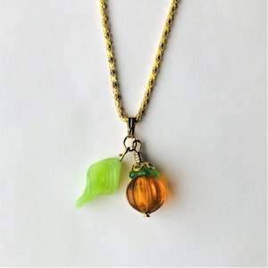 Realistic Persimmon Fruit Striped Glass Persimon Fruit Pendant, Organic Food, Green Leaf, Gold Plated Necklace Gift for her by enchantedbeas