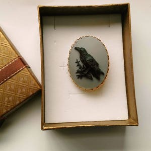 Black Raven Oval  Brooch Gothic Crow Raven Black Bird Goth 40 x 30 mm Golden Filigree Frame Resin CAMEO Brooch Gift for her Halloween Brooch
