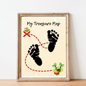 May include: A framed print featuring a treasure map design. The map includes two black footprints, a red dotted path, and a treasure chest with palm trees. The text "My Treasure Map" is at the top, with a red "X" and a small green parrot.
