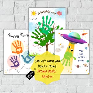 May include: Three colorful art prints with handprint designs. One says "Happy Birth" with handprint balloons. Another depicts a handprint tree with the text "Friendship Tree." The third shows an alien with the text "Too cute for this planet."