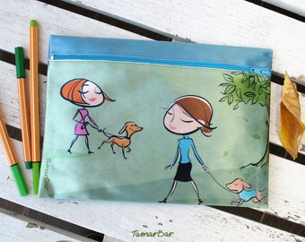 light green zipper clutch with an illustration of walking the dogs