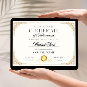 May include: A certificate of achievement with a gold border and ornate design. The certificate is presented to Michael Scott for successful completion of COURSE NAME. The date signed is Jan 12 2024 and the mentor is Arden Valiur.