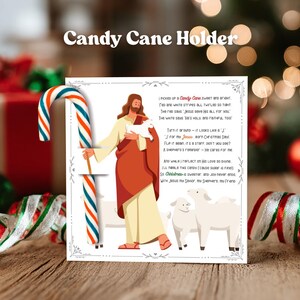 May include: A candy cane holder featuring a candy cane with red, white, and blue stripes. The holder has an illustration of Jesus with a lamb and two sheep, with a poem about Christmas. The text at the top says "Candy Cane Holder".