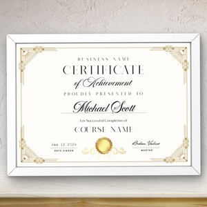 May include: A white framed certificate with gold accents and a gold seal. The certificate reads "BUSINESS NAME CERTIFICATE of Achievement PROUDLY PRESENTED TO Michael Scott For Successful Completion of COURSE NAME Jan 12 2024 DATE SIGNED Aiden Valiur MENTOR"