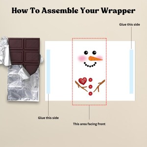 May include: An instructional image shows how to assemble a snowman-themed chocolate bar wrapper. The wrapper features a snowman face with a carrot nose, black eyes, and a dotted smile. The image includes a chocolate bar and instructions.