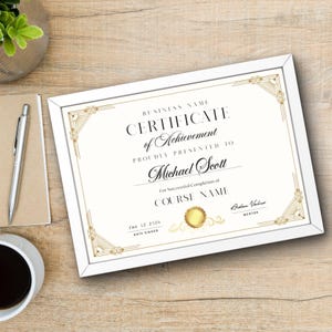 May include: A white framed certificate with gold accents, featuring the text "CERTIFICATE of Achievement" and "PROUDLY PRESENTED TO Michael Scott". The certificate is dated "Jan 12 2024" and signed by "Arden Valius, MENTOR".