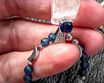 Himalayan Tantric Twin on a Sapphire necklace with steel crescent moons