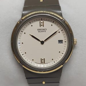 Orologio al quarzo vintage Seiko 5P39-6020 / Cassa e bracciale rivestiti grigio scuro / Quadrante crema / Bracciale originale / Prodotto in Giappone negli anni '90