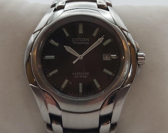"Citizen Marinaut Titanuhr - schwarzes Zifferblatt, ""Saphirglas"", 100 m WR."