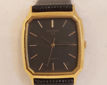 Reloj Orient VX Tank vintage: caja octogonal dorada y esfera negra