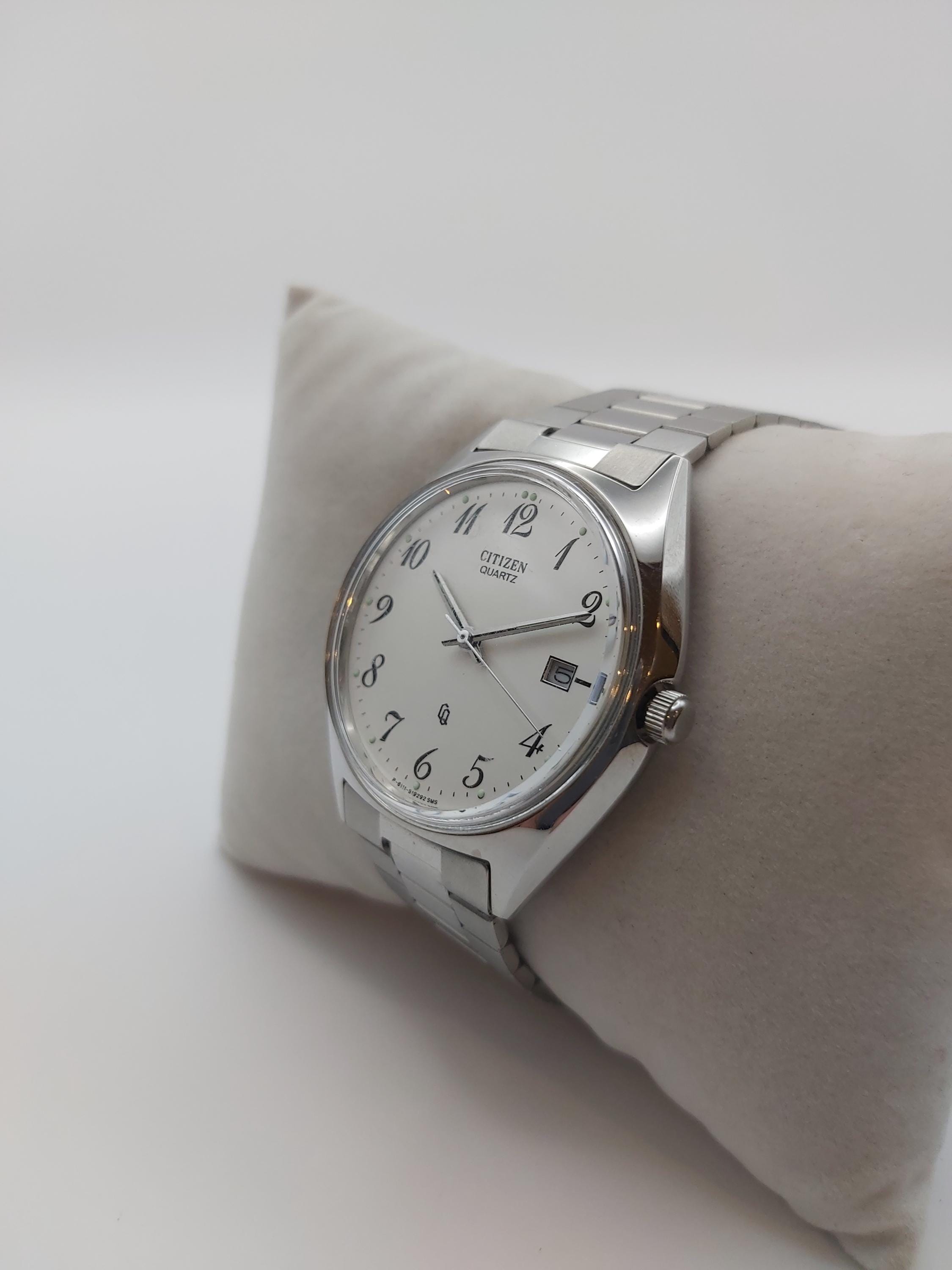 Vintage Citizen Quartz Watch: Stainless Steel, White Arabic Dial