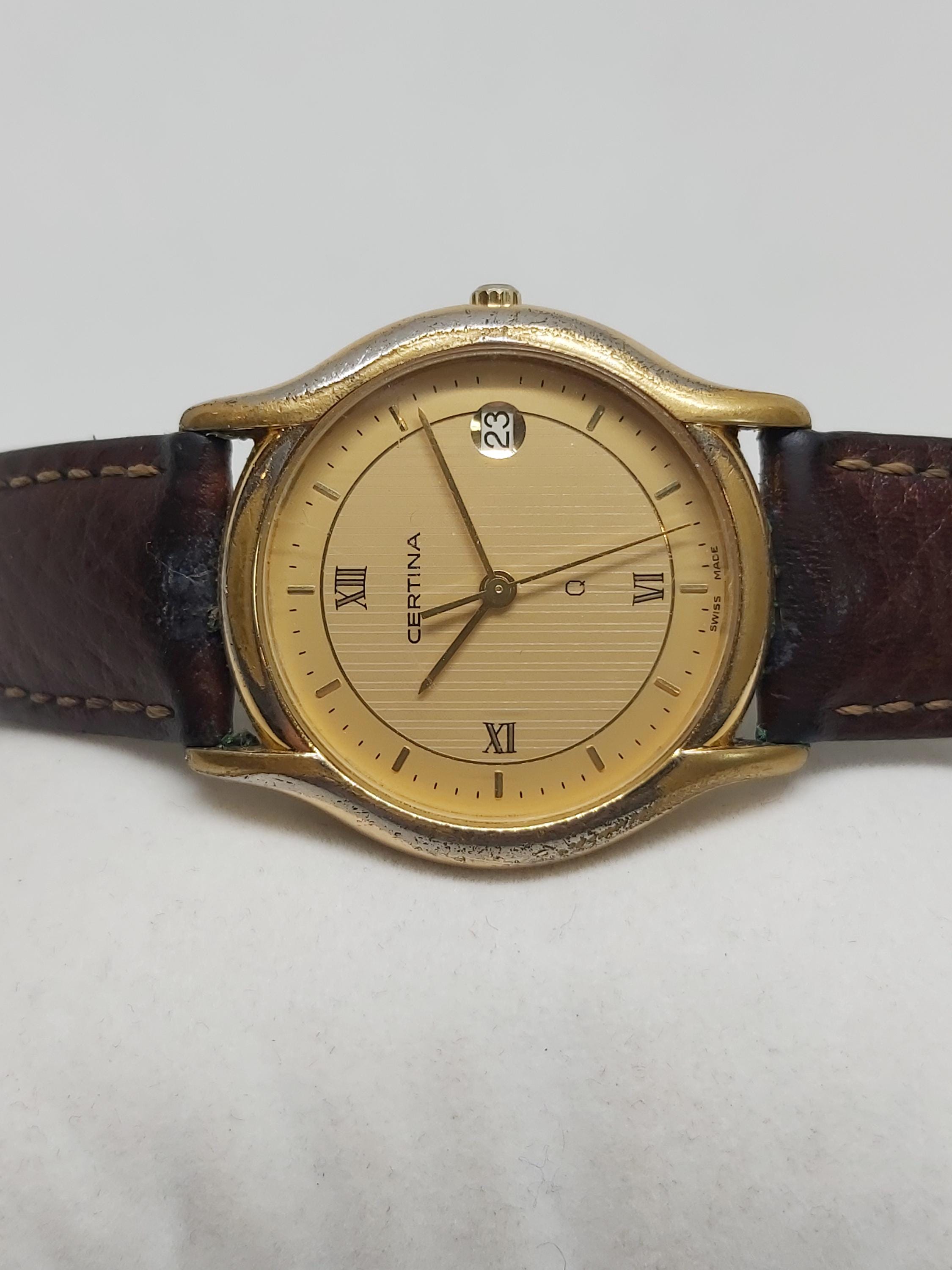 ヴィンテージ サーチナ クォーツウォッチ：スイスゴールド文字盤