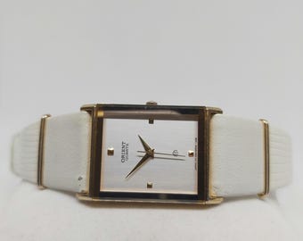 Vintage Orient Tank Watch: Gold-Tone, Silver Dial, Ultra-Thin