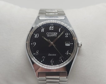 Reloj Citizen Quartz Seven para hombre – Esfera negra / Brazalete original / Vintage 1994 / Totalmente funcional
