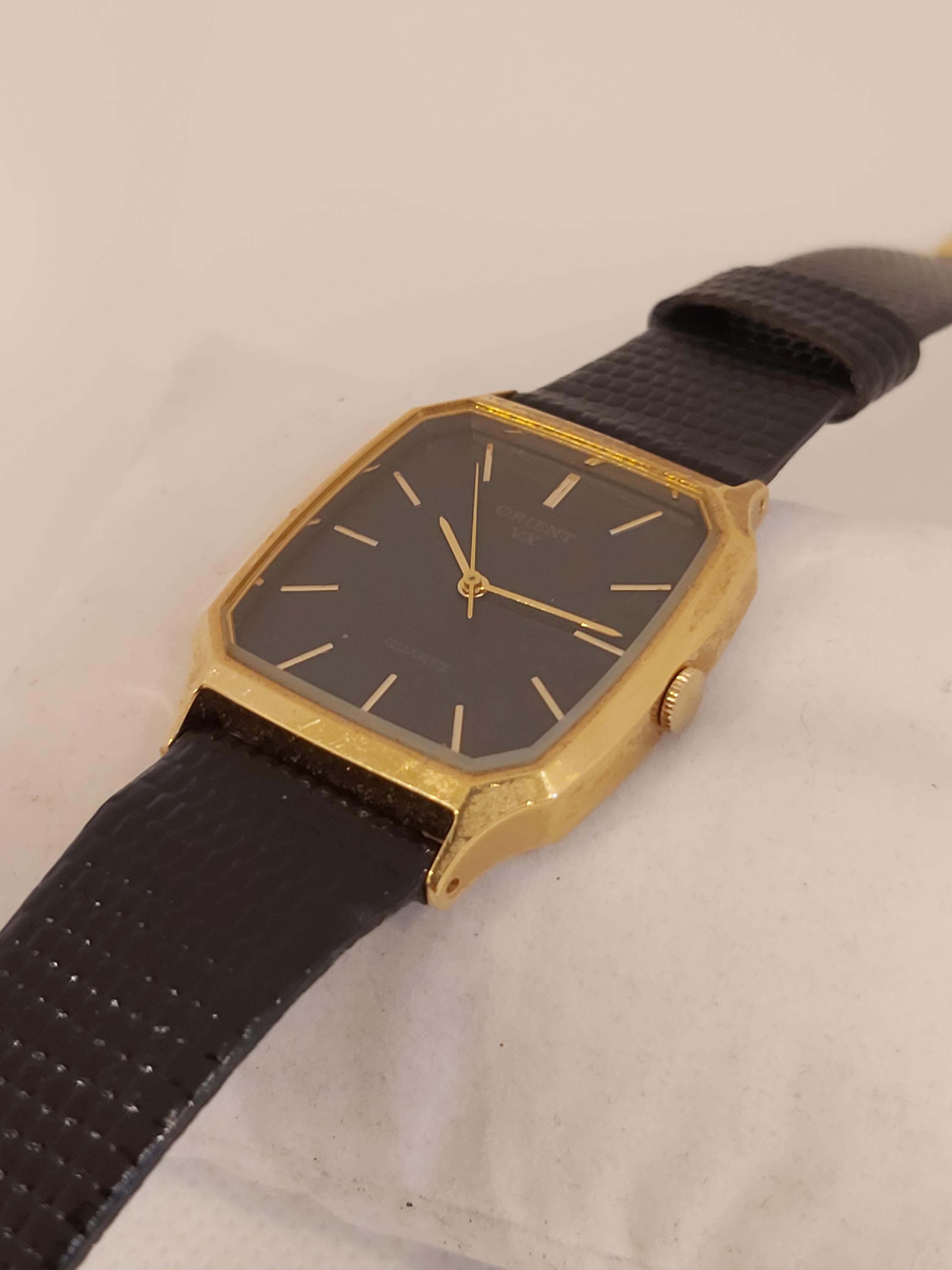 Vintage Orient VX Tank Watch: Octagonal Gold-tone Case, Black Dial