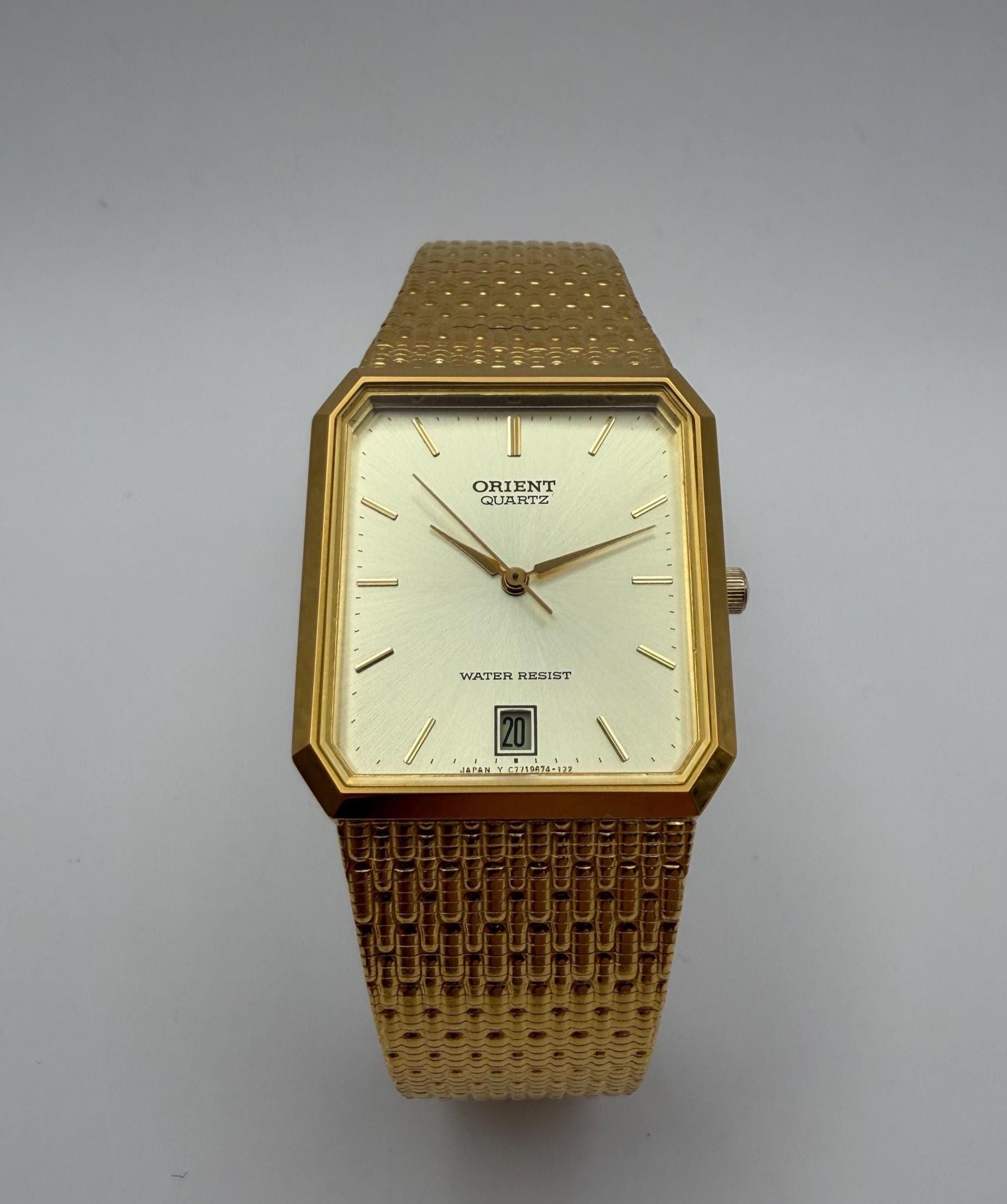 ORIENT QUARTZ 腕時計 ゴールドカラー 本体 il_fullxfull.7527669698_2lud.jpg