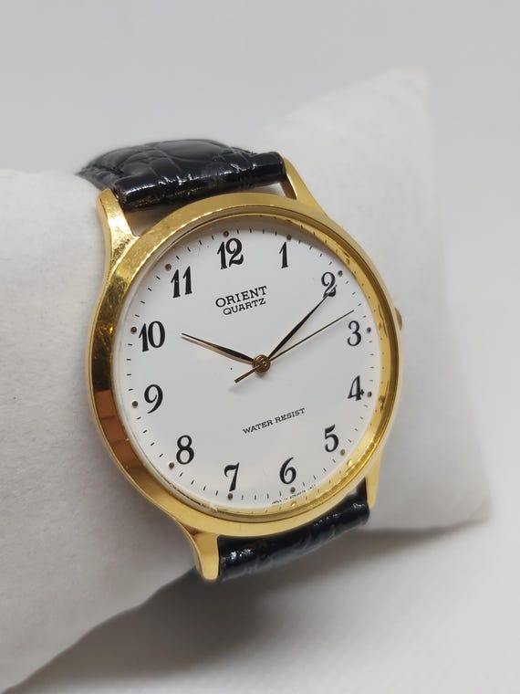 Elegant Vintage Orient Quartz Watch – Gold-tone Minimalist Design