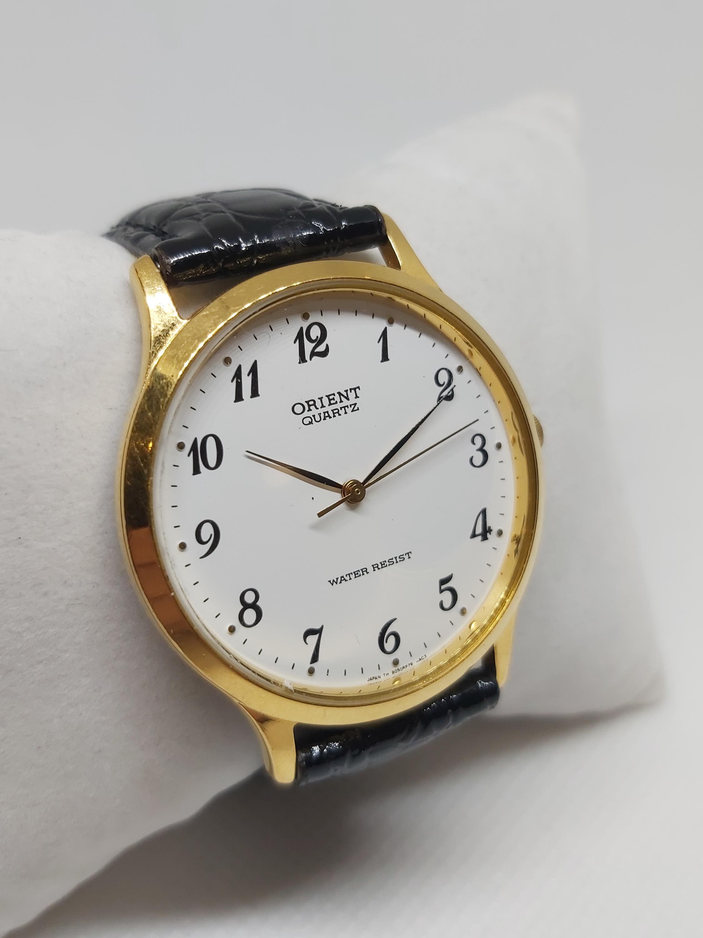 Elegant Vintage Orient Quartz Watch – Gold-tone Minimalist Design