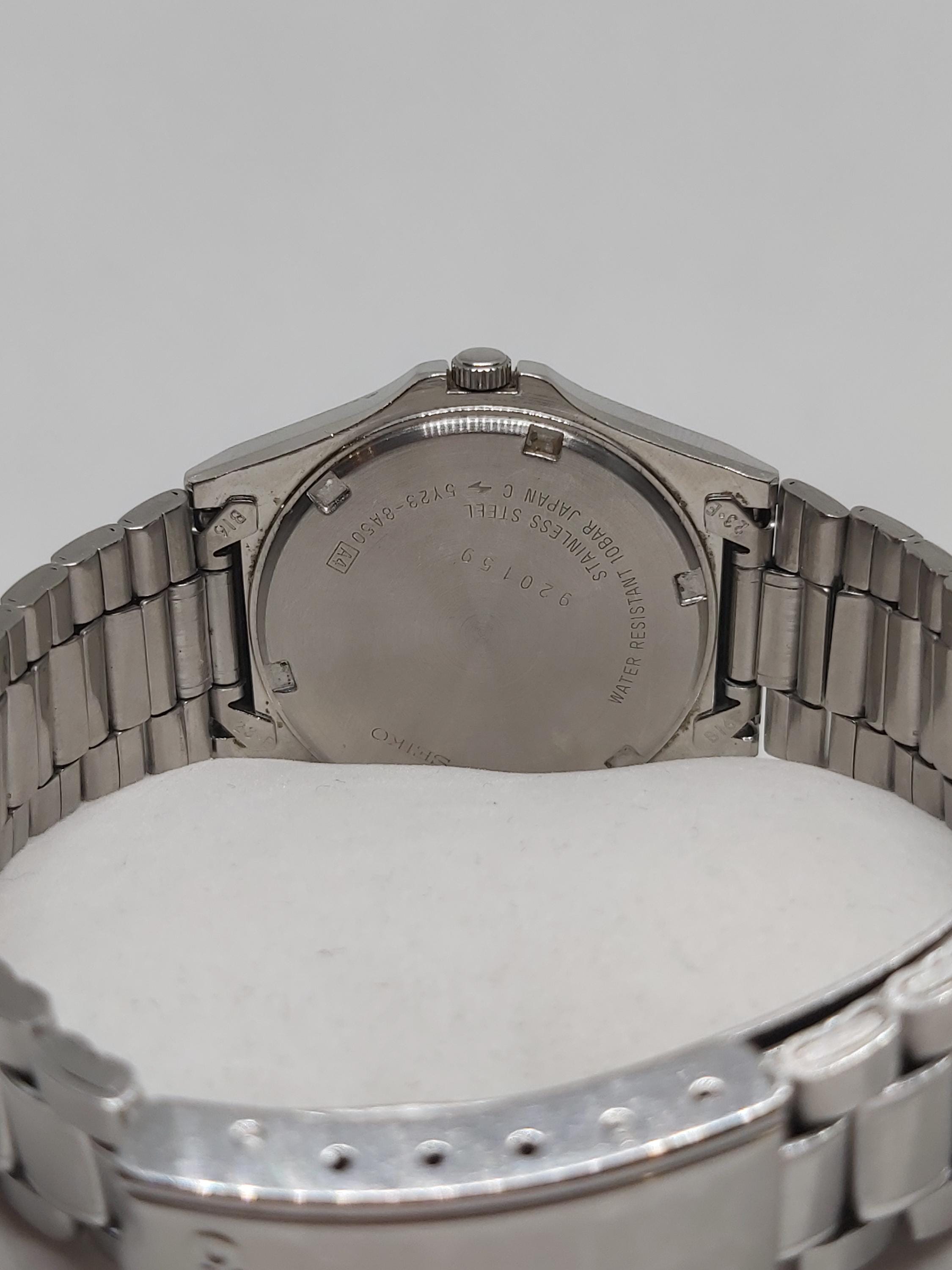 Seiko SQ 100 Quartz Watch – Black Dial, Vintage 1989