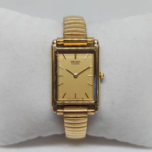 Seiko Ladies Quartz Watch | Ref 2P20-5D80 | Ultra-Slim Gold-Tone Tank | Sparkling Dial | Vintage 1990s | Stretch Bracelet