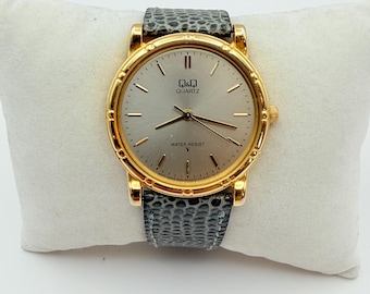 Orologio da polso vintage Q&Q color oro – Movimento giapponese minimalista, cinturino grigio testurizzato