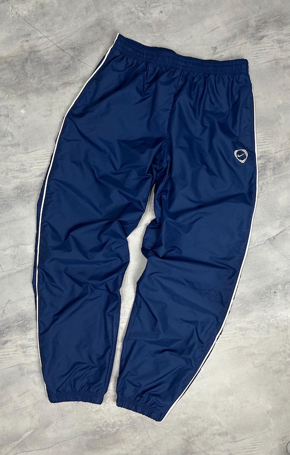 nike tuned air track pants