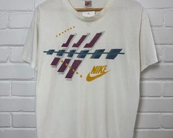 Vintage 80s/90s Nike Graphic Spell Out Abstract T Shirt Size L White