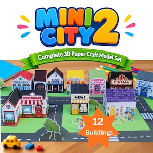 Puede incluir: Un set de manualidades en papel 3D titulado Mini City 2 que incluye 12 edificios coloridos como una farmacia, librería, juguetería, floristería, cine, comisaría, restaurante y quiosco de prensa dispuestos sobre un tapete de juego con carreteras.