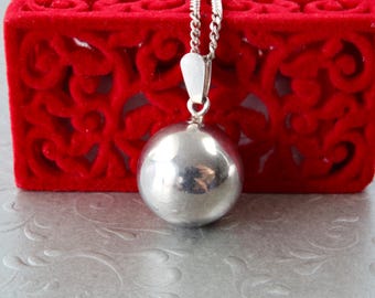 Sterling silver necklace with ball pendant