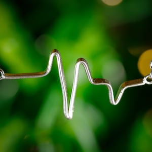 Elegant Heartbeat Necklace in Sterling Silver