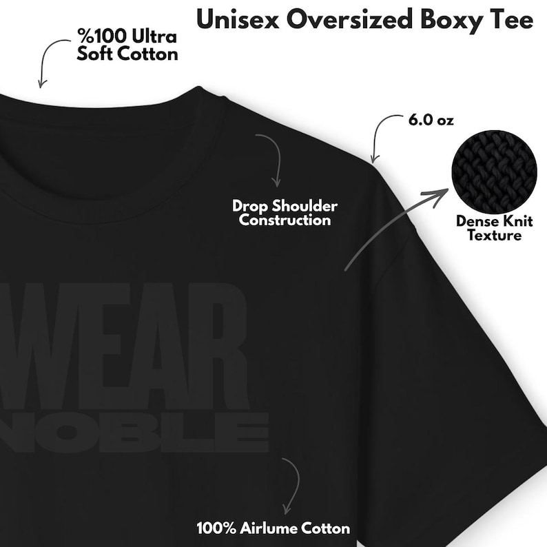 Puede incluir: Camiseta unisex negra de corte holgado y holgado, confeccionada en 100% algod&oacute;n Airlume. La camiseta presenta una construcci&oacute;n de hombros ca&iacute;dos y una textura de punto denso. La camiseta pesa 170 gramos. El texto "WEAR NOBLE" es visible.