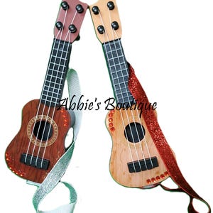 Miniature guitars suitable for dolls.